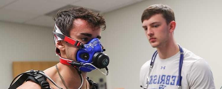 students work together in an exercise science clinical lab